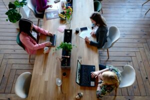 Three Women Collaborating In A Coworking Space