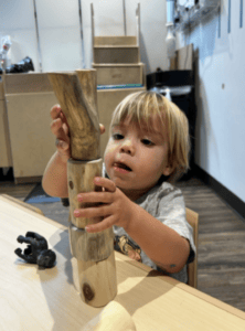 Pillar Kids Playing A Stacking Activity 