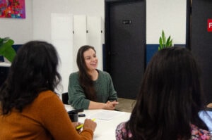 One-On-One Conversation In A Coworking Community