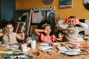Toddler Finger Painting With Bright Colors
