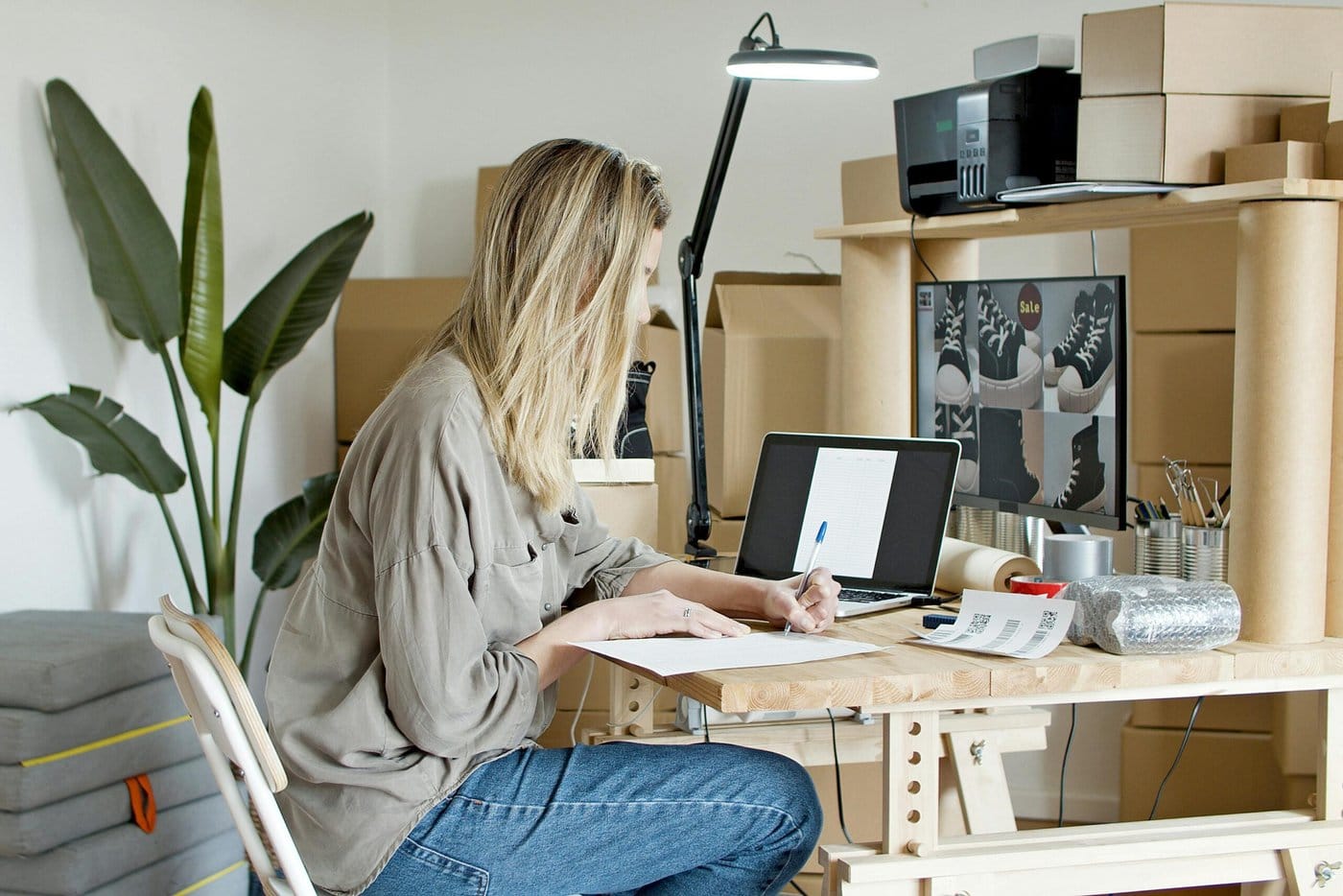 Freelancer working on a side hustle in a coworking space