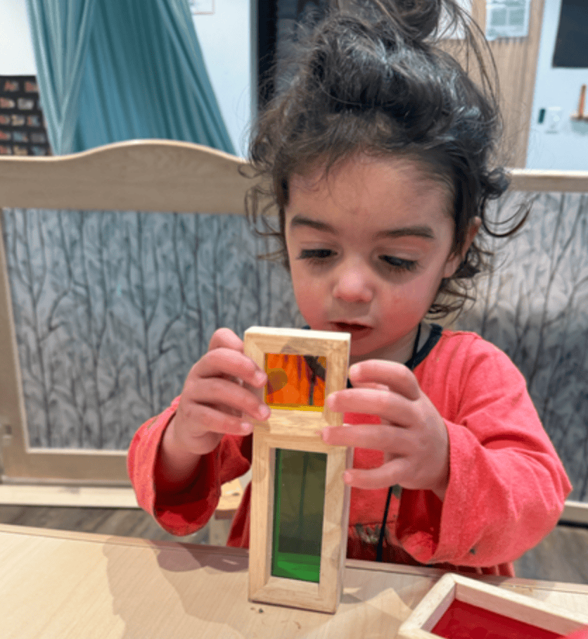 preschooler playing bricks