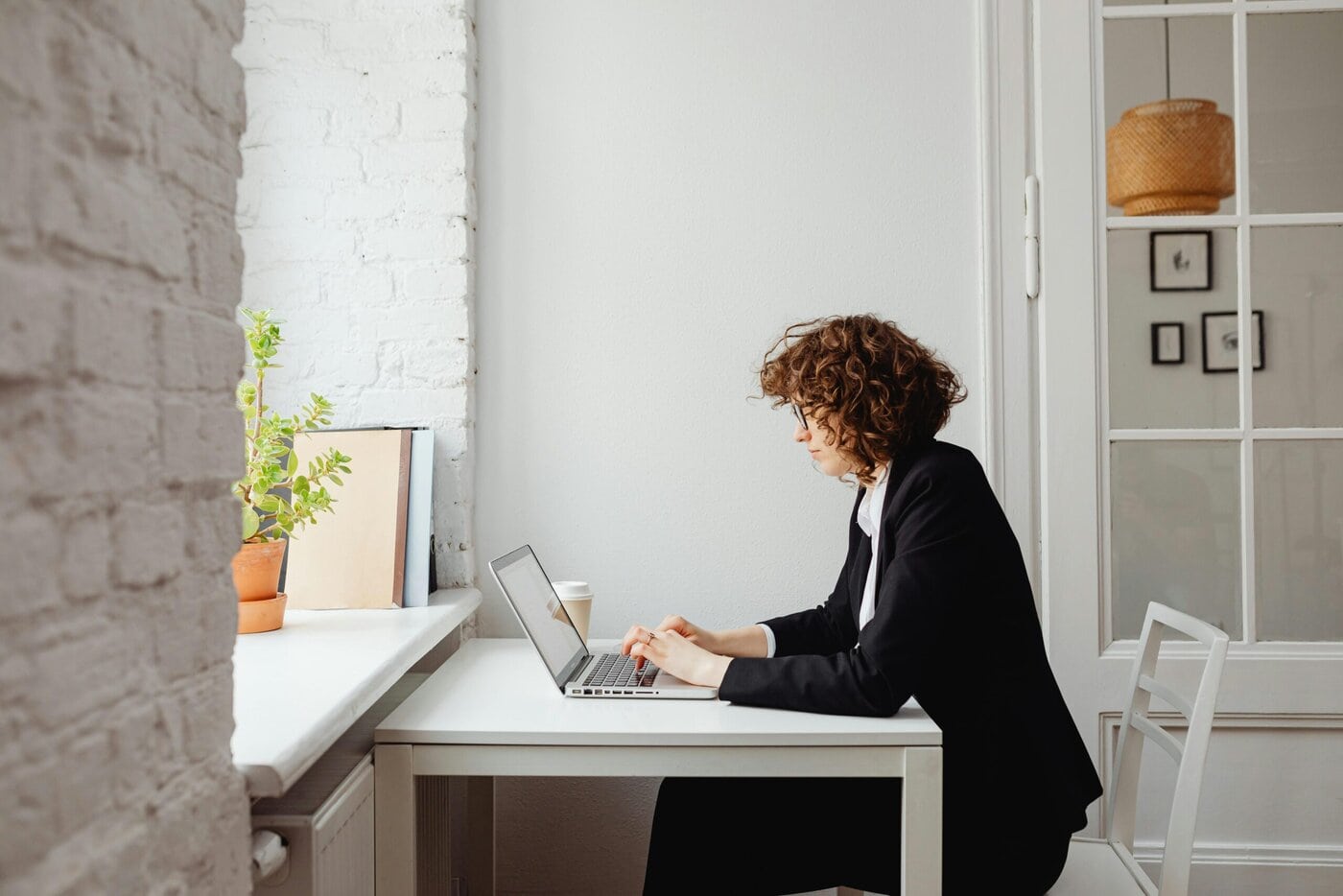 woman-in-black-suit-working